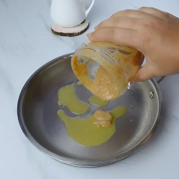 Dairy Milk Silk Dates Payasam with Rose Cashew Crumble - Heat ghee in a pan