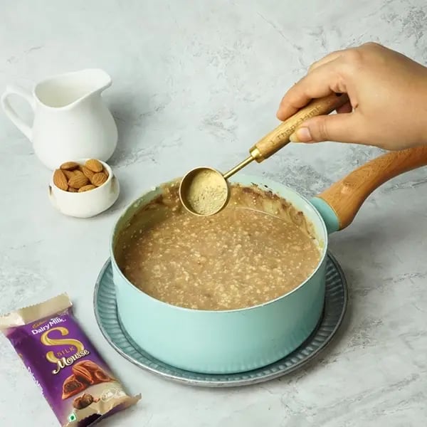 Dairy Milk Silk Habsi Halwa-Add cardamom powder to the halwa