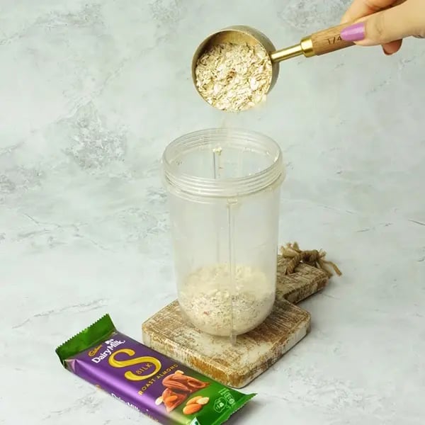 Dairy Milk Silk Oats Dates Bar - Add the rolled oats