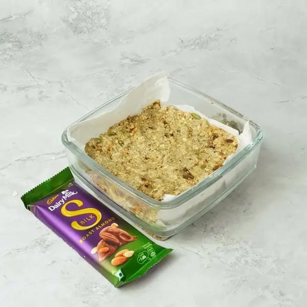 Dairy Milk Silk Oats Dates Bar - Transfer the mixture to a molding tray or plate