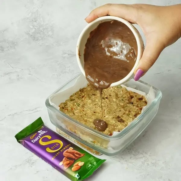 Dairy Milk Silk Oats Dates Bar - Remove the set mixture from the fridge