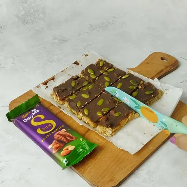 Dairy Milk Silk Oats Dates Bar - Cut it into bar-sized pieces