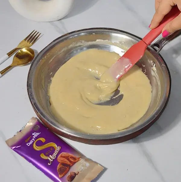 Dairy Milk Silk Pistachio Peda - Stir well