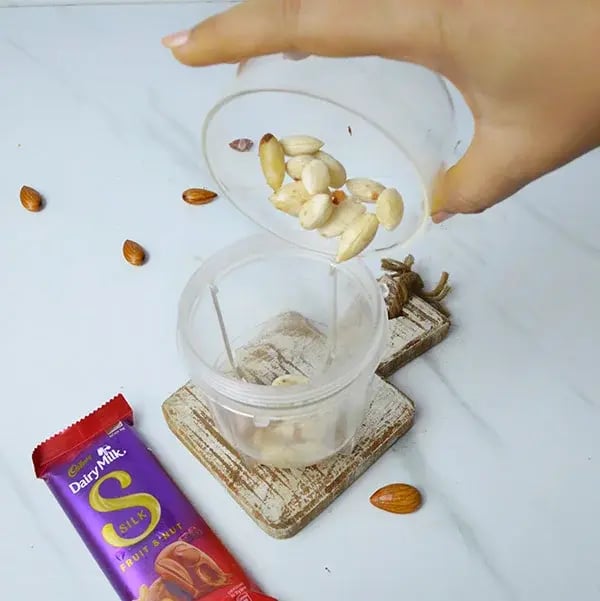Dairy Milk Silk Rich and Creamy Badam Halwa - Grind the soaked almonds
