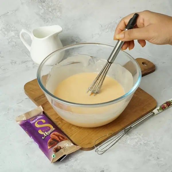 Dairy Milk Silk Tres Leches Cake-Pour 120 ml of milk