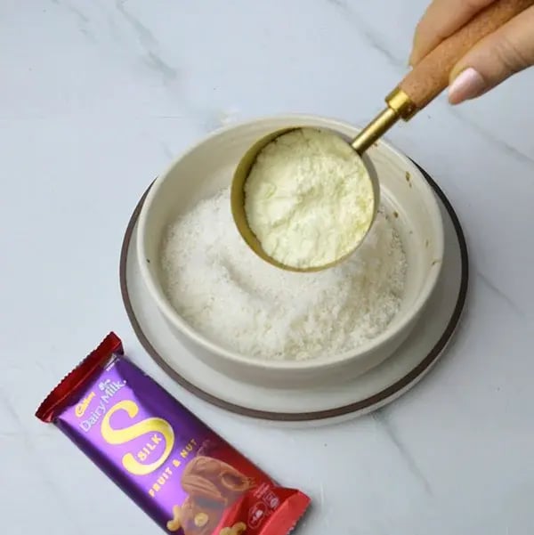 Dairy Milk Silk Two-in-One Coconut Laddoo - Add desiccated coconut