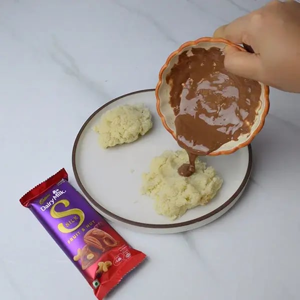 Dairy Milk Silk Two-in-One Coconut Laddoo - Mix the melted chocolate