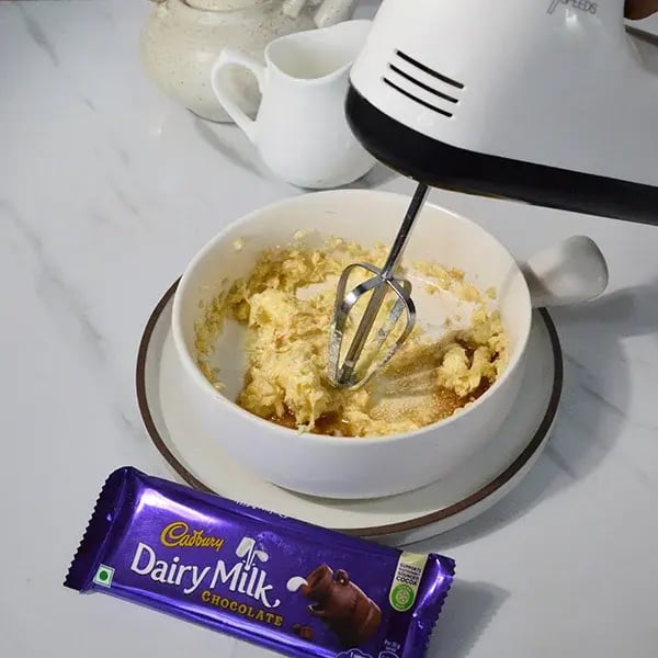 Dairy Milk Stuffed Chocolate Shortbread Cookies - Beat the mixture