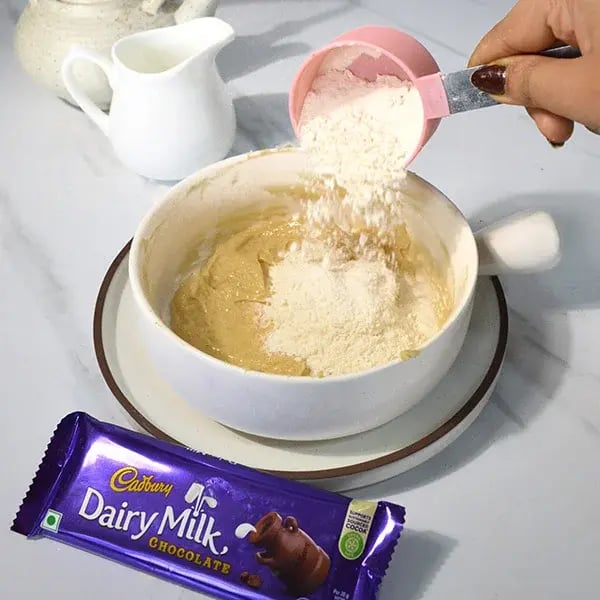 Dairy Milk Stuffed Chocolate Shortbread Cookies - Add all-purpose flour