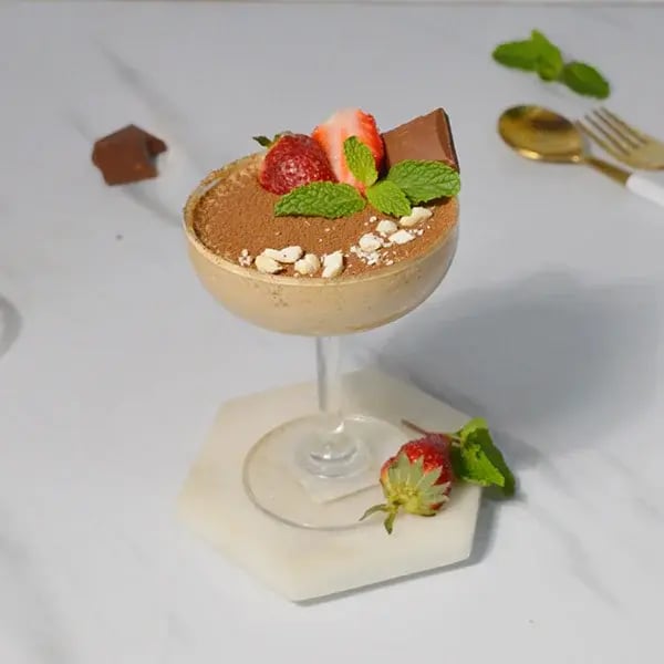 Dairy Milk Thandai Mousse With Cashew Crunch - Garnish with chopped cashews