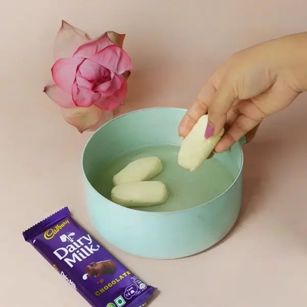 Dairy Milk Two-in-One Chomchom for Kali Puja-Carefully drop chomchoms into the syrup