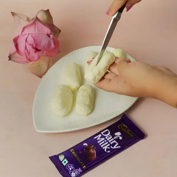 Dairy Milk Two-in-One Chomchom for Kali Puja-Slit the chomchoms lengthwise