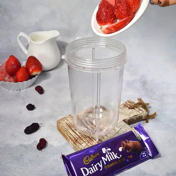 Dairy Milk Vanilla Berry Milkshake - Mix some chopped strawberries