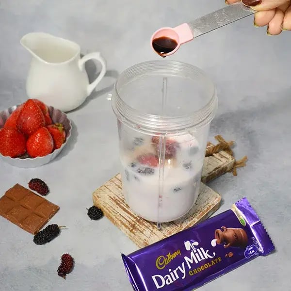 Dairy Milk Vanilla Berry Milkshake - Add vanilla essence