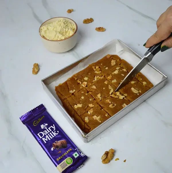 Dairy Milk Walnuts Infused Besan Barfi - Cut into pieces