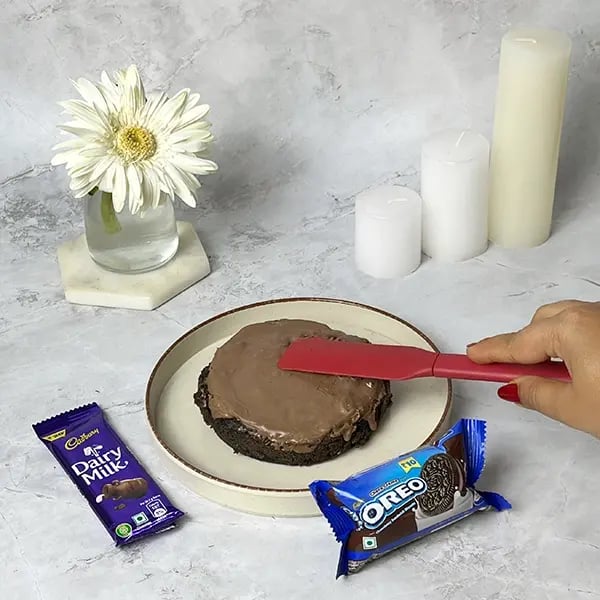 Dairymilk Oreo Biscuits Cake - Pour the melted chocolate
