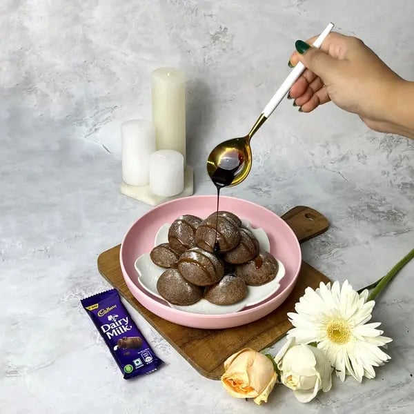 Dairymilk Choco Lava Cake Bomb - Powdered Sugar Dusting