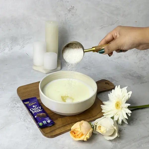 Dairymilk Choco Lava Cake Bomb - Adding Sugar To Bowl