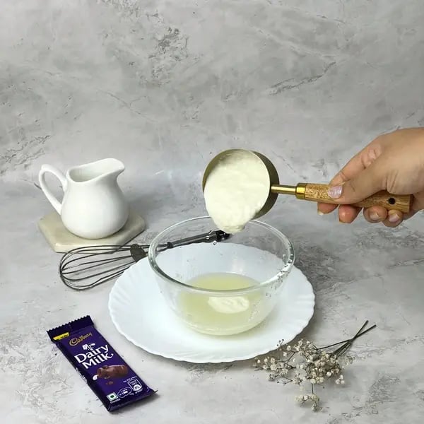 Dairymilk Chocolate Caramel Cupcakes - Whisking Curd Mixture