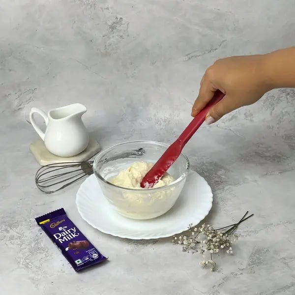 Dairymilk Chocolate Caramel Cupcakes - Folding Batter Gently