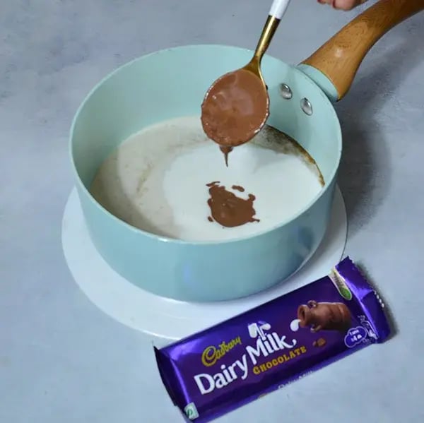 Dairymilk Chocolate Cashew Ice-cream - Pour melted chocolate