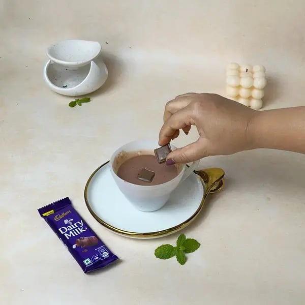 Dairymilk Cocoa Lava Mug Cake - Pressing Chocolate Pieces