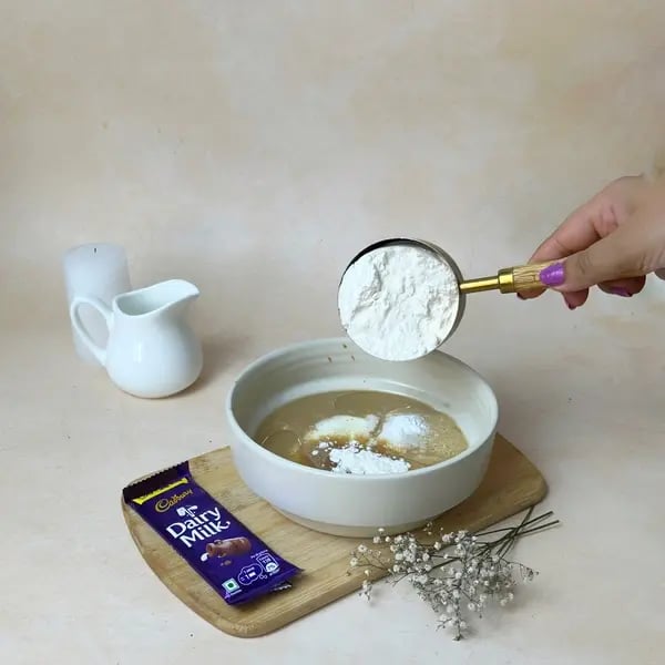 Dairymilk Coffee Star Cake - Sifting Flour Into Bowl