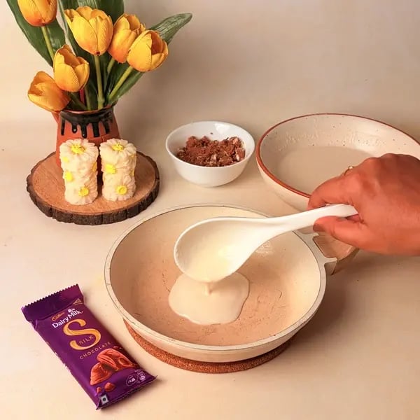Diwali Special Bengali Patishapta Recipe With Cadbury Dairy Milk Silk And Mawa Filling - Spreading Batter On Pan