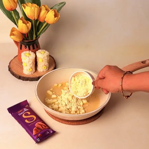 Diwali Special Bengali Patishapta Recipe With Cadbury Dairy Milk Silk And Mawa Filling - Crumbled Mawa In Pan