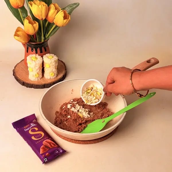 Diwali Special Bengali Patishapta Recipe With Cadbury Dairy Milk Silk And Mawa Filling - Mixing Nuts