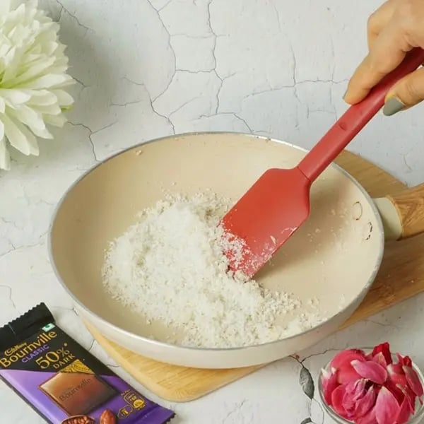 Diwali Special Bournville Dry Fruits Laddoo-To the same pan add the dedicated coconut
