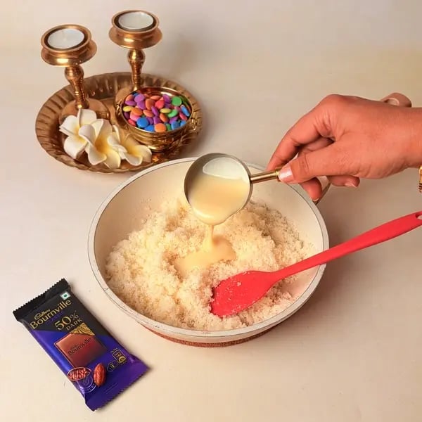 Diwali Special Chocolate Coconut Barfi With A Cadbury Twist - Mixing Condensed Milk