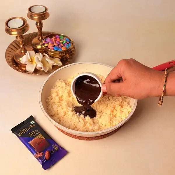 Diwali Special Chocolate Coconut Barfi With A Cadbury Twist - Stirring Melted Chocolate