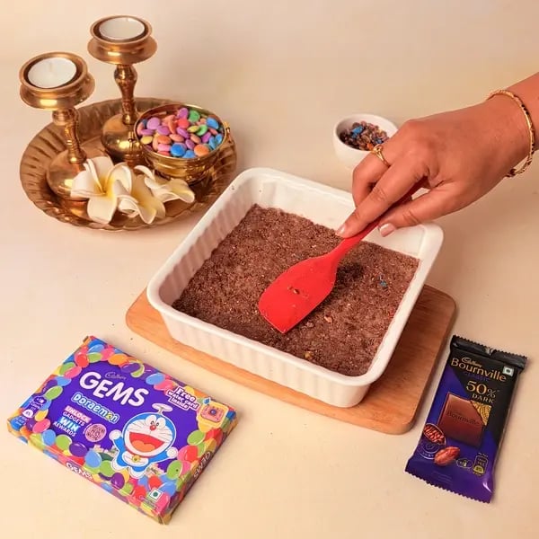 Diwali Special Chocolate Coconut Barfi With A Cadbury Twist - Pressing Barfi Mixture