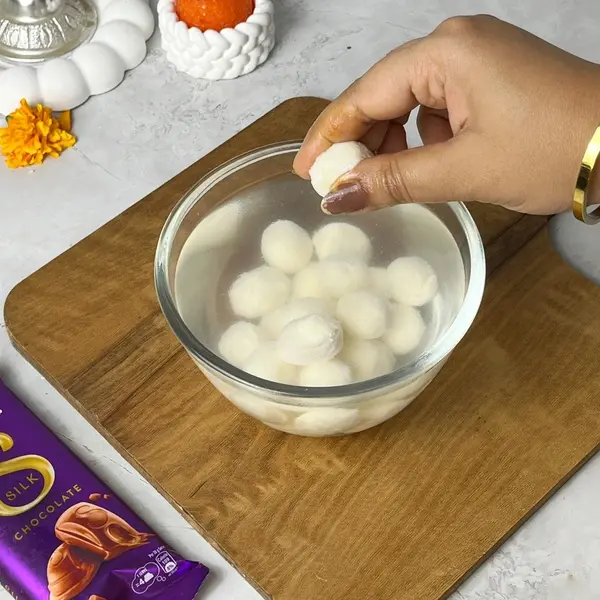 Diwali Special Dairy Milk Silk-Infused Angoor Basundi Recipe - Squeezing Rasgulla