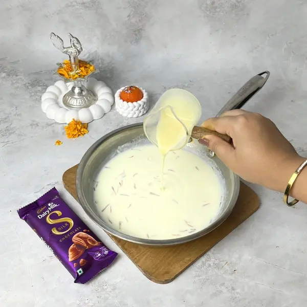 Diwali Special Dairy Milk Silk-Infused Angoor Basundi Recipe - Simmering Basundi