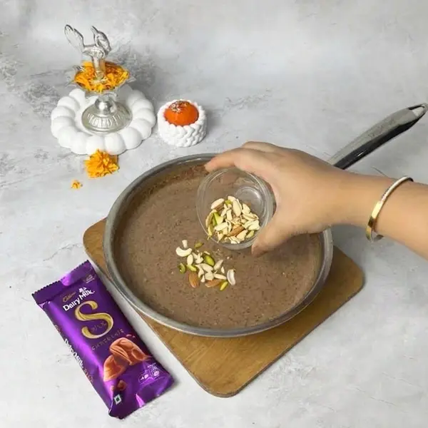 Diwali Special Dairy Milk Silk-Infused Angoor Basundi Recipe - Adding Nuts