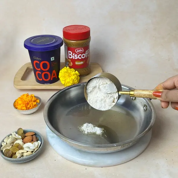 Diwali Special Pinni Recipe With Biscoff And Cadbury Cocoa Powder - Roasting Flour In Ghee