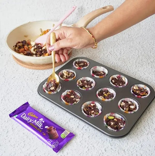 Dry Fruit &amp; Chocolate Chikki Cups - Add a spoonful of melted chocolate