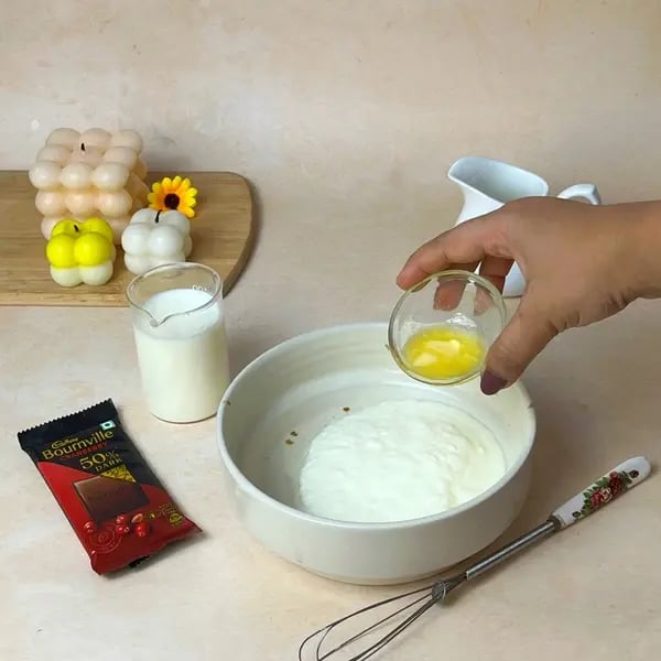 Easiest Bournville Mirror Glaze Cake - Whisking Ingredients In Bowl