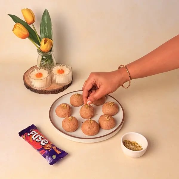 Easy Festive Special Rava Laddu With Cadbury Fuse To Celebrate Navratri - Arranged Laddus Pistachios Varq