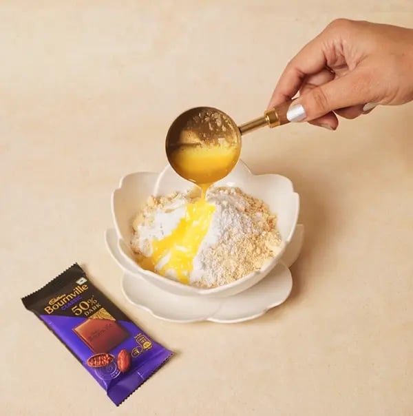 Eggless Chocolate Ganache Tart with Cadbury Bournville-Add powdered sugar to the mixture