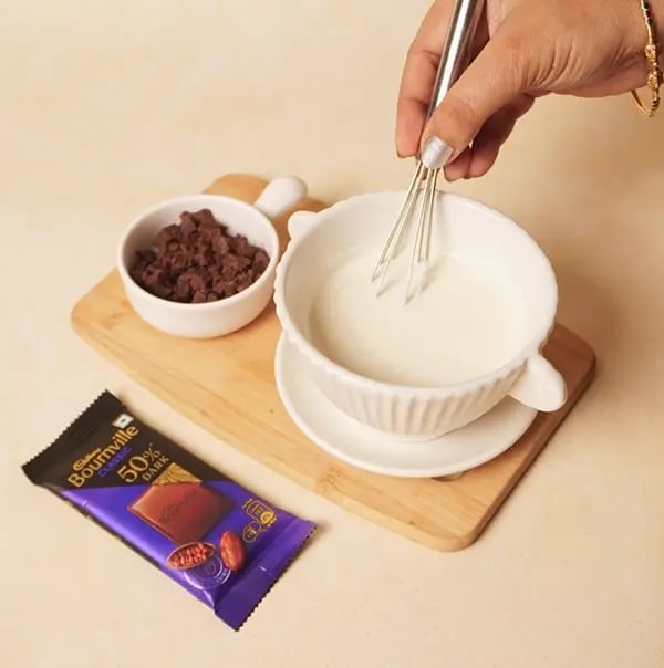 Eggless Chocolate Ganache Tart with Cadbury Bournville-Gently heat the heavy cream