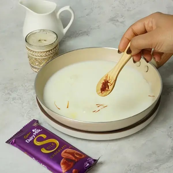 Eid Special Dairy Milk Silk Phirni - Add milk in a pan