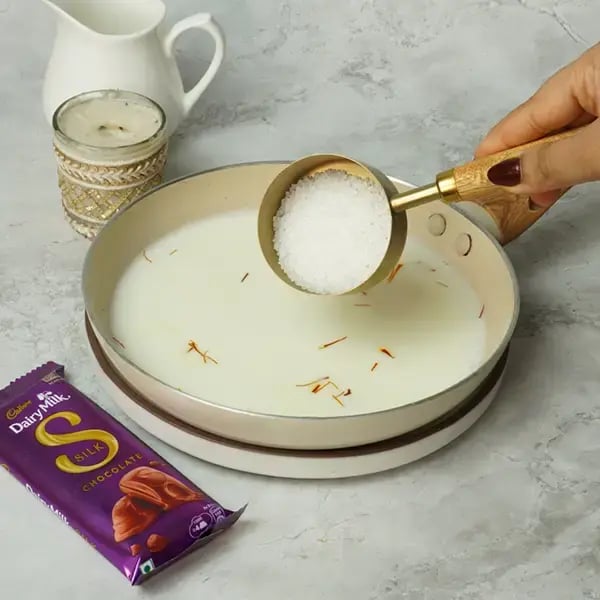 Eid Special Dairy Milk Silk Phirni - Add sugar to the milk