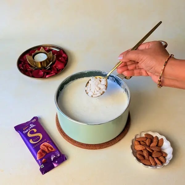 Elaneer Payasam With Cadbury Dairy Milk Silk Chocolate For Onam - Mixing Coconut Pieces