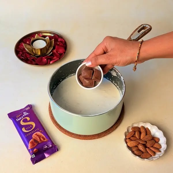 Elaneer Payasam With Cadbury Dairy Milk Silk Chocolate For Onam - Adding Chocolate Pieces