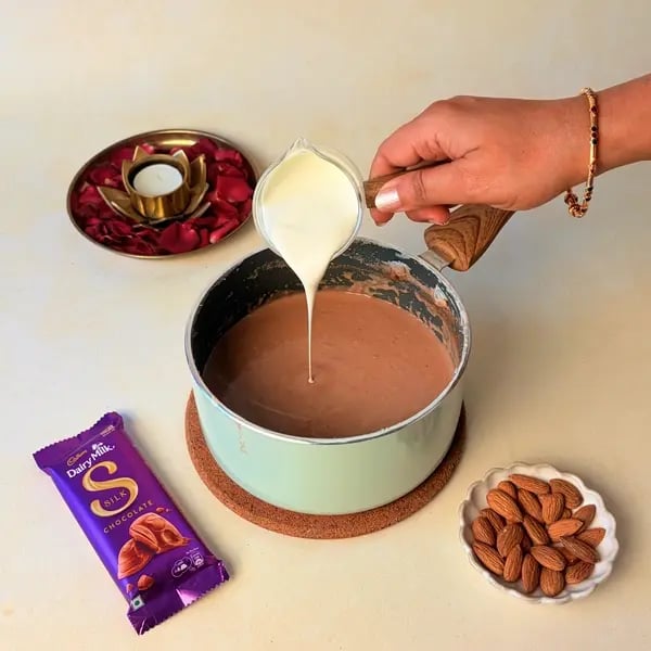 Elaneer Payasam With Cadbury Dairy Milk Silk Chocolate For Onam - Stirring Coconut Cream