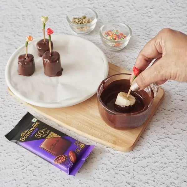 Frozen Bournville Chocolate Banana Bites - Insert a toothpick into each banana piece