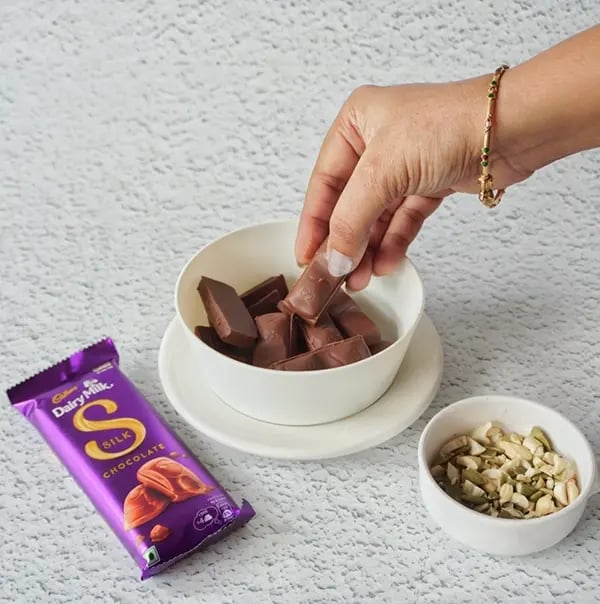 Frozen Silk Chocolate Bites with Nuts and Oreo Crumble - Silk chocolate into small pieces